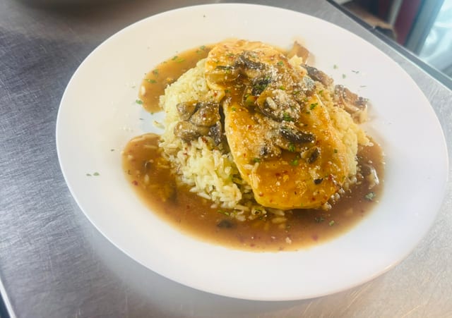 7. Chicken Marsala over white rice.