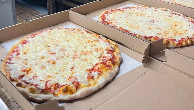 2 Lg Pie Cheese Pizza Specials.